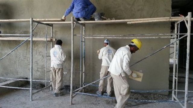 لياسة الجدران وضبط المناسيب